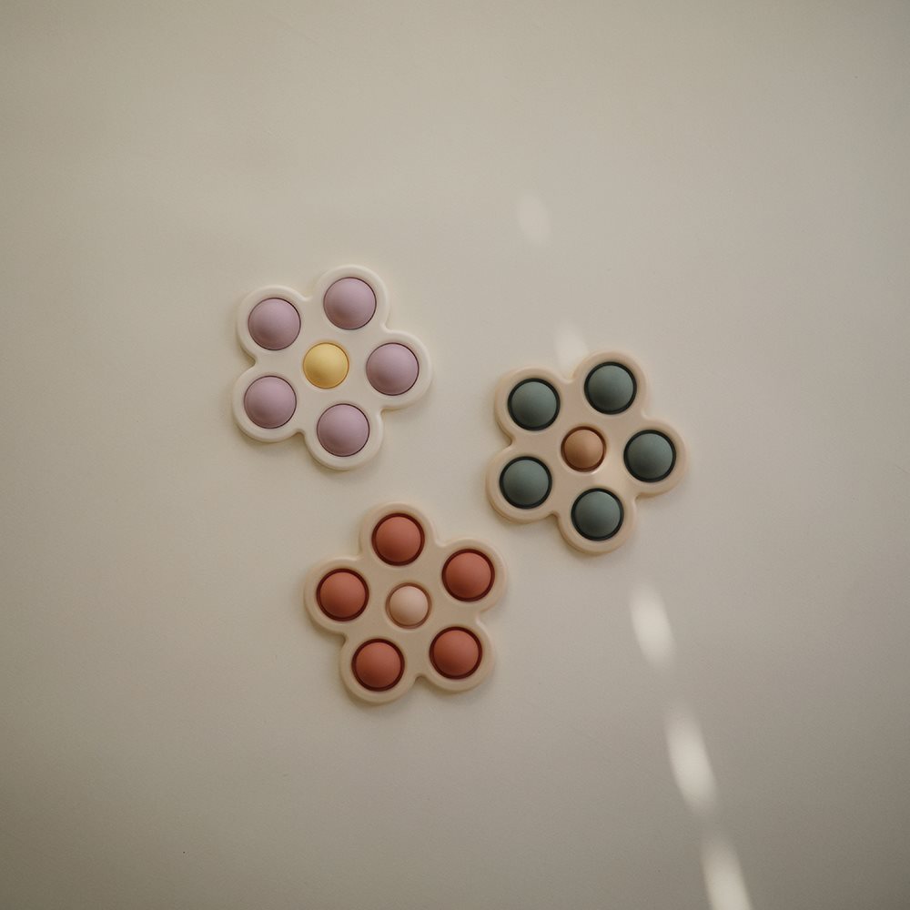 Mushie pop-it mänguasi lill